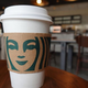 starbucks coffee cup on table
